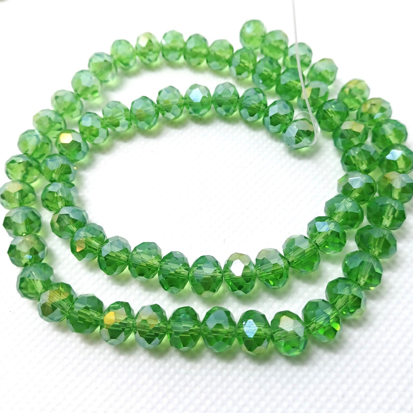 Chinese Crystal Beads Rondelle Shape, Color Green with Gold AB Plating 8mm X 6mm Beads