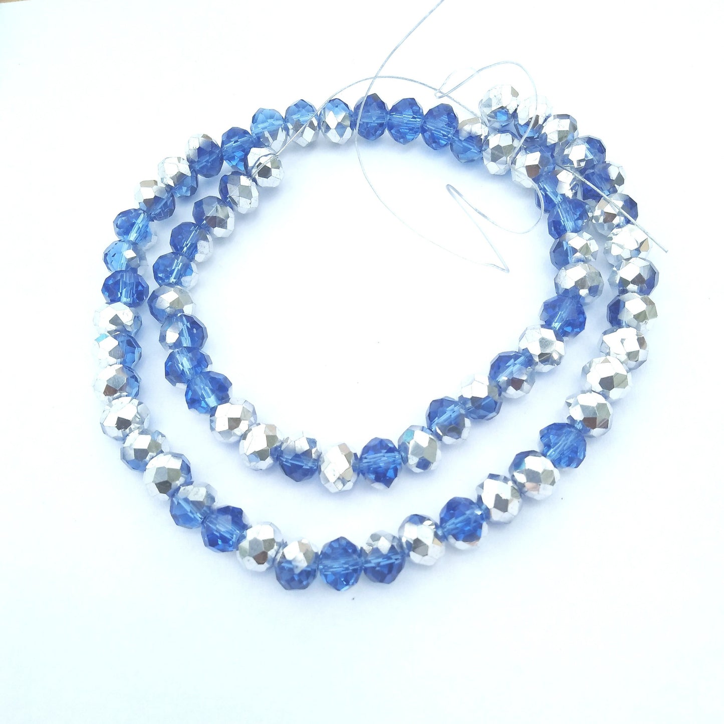 Chinese Crystal Beads Rondelle Shape, Color Sapphire and Silver 68 Beads